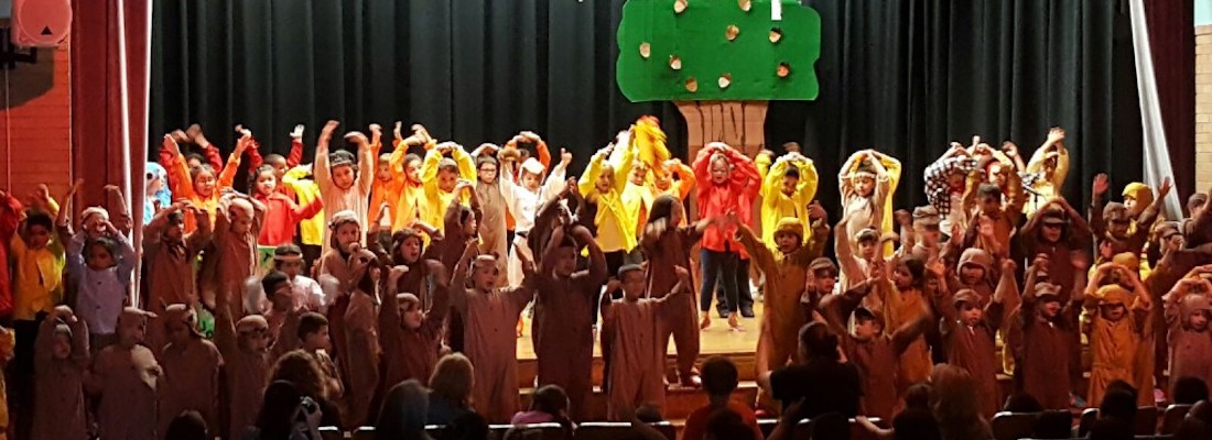 Students performing on stage