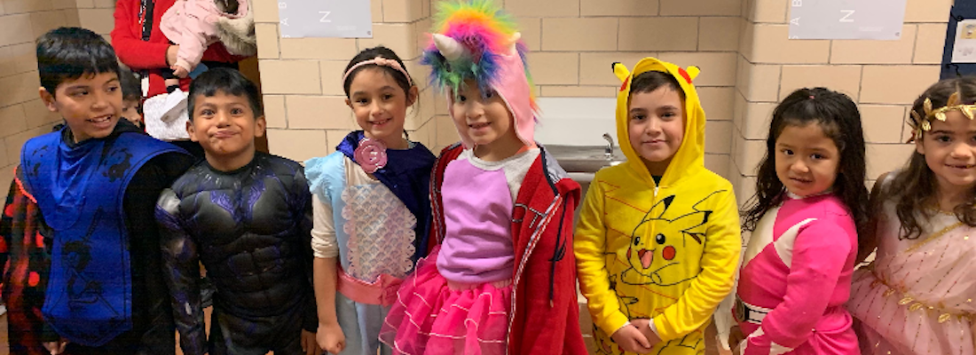 Group of students posing in costumes